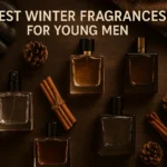 Flat lay of men’s perfume bottles with winter accessories like pinecones, cinnamon, and scarf