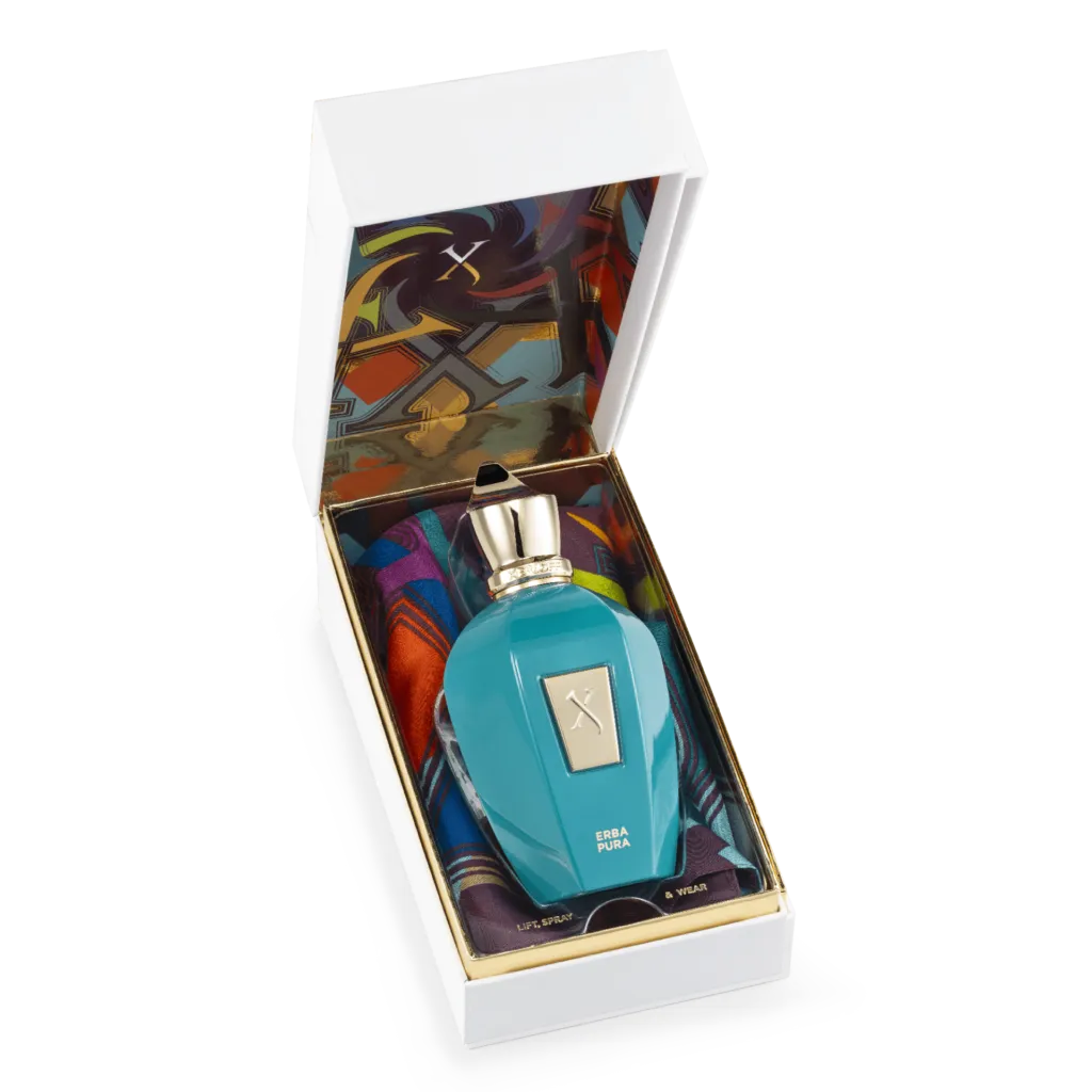 A bottle of Erba Pura By xerjoff, showing the unboxing and the silk scarf.