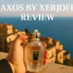 Naxos by Xerjoff bottle overlooking the Sicilian sea and architecture