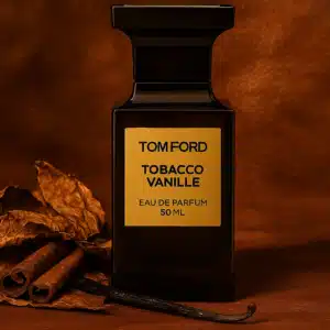 Tom Ford Tobacco Vanille perfume bottle with tobacco leaves and vanilla pods.