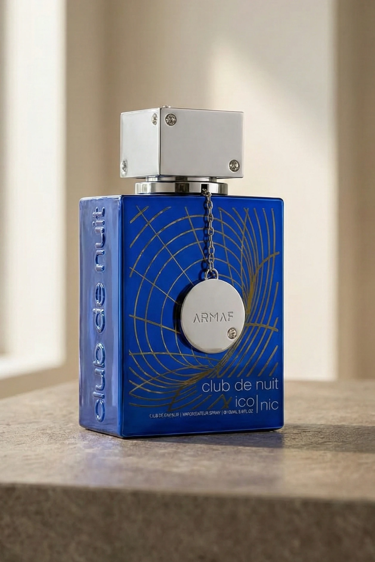 Armaf Club de Nuit Blue Iconic bottle in an editorial card image